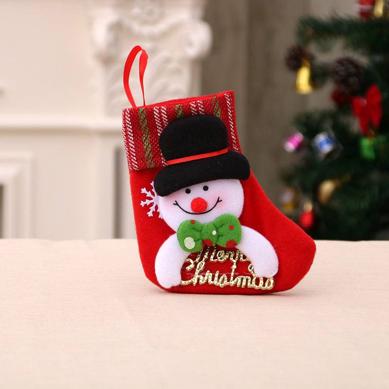 Red Christmas sock decoration with snowman and Merry Christmas text, festive holiday decor