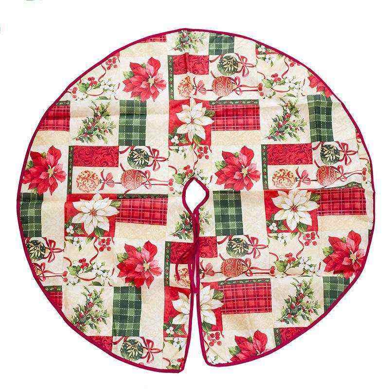 colorful patchwork Christmas tree skirt with floral and plaid patterns in red, green, and white