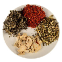 Herbal ingredients for foot bath foot bag on a white plate