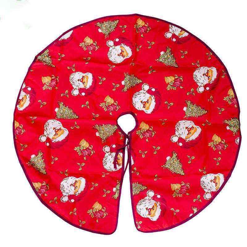 red Christmas tree skirt with Santa Claus and Christmas tree patterns