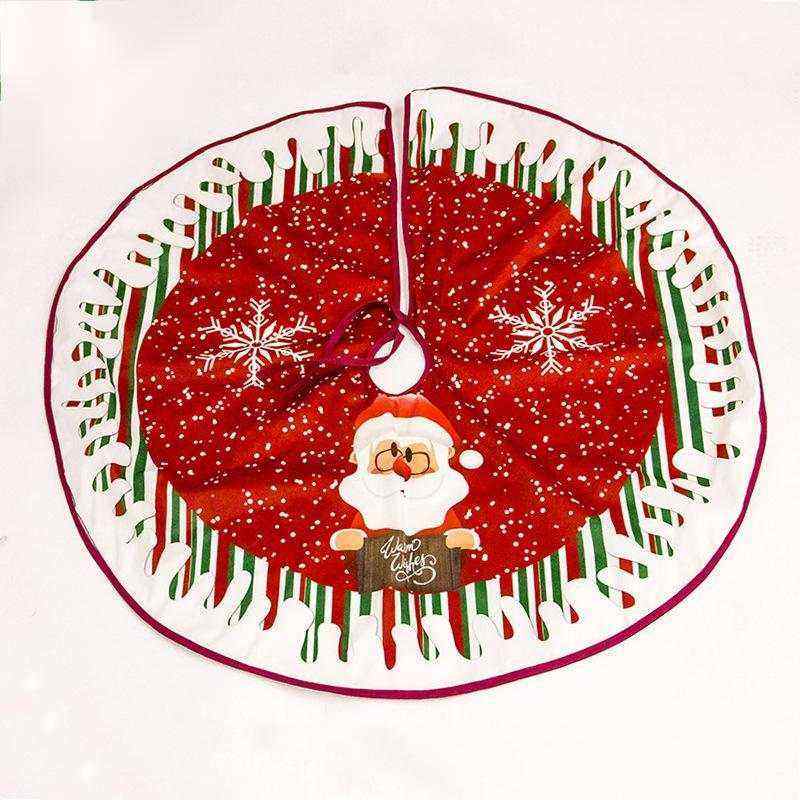 Red Christmas tree skirt with Santa Claus and snowflake design, made of soft fabric and flannel, festive holiday decoration.