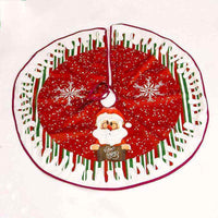 Red Christmas tree skirt with Santa Claus and snowflake design, made of soft fabric and flannel, festive holiday decoration.