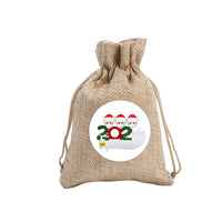 Christmas candybags filled with festive treats and gifts