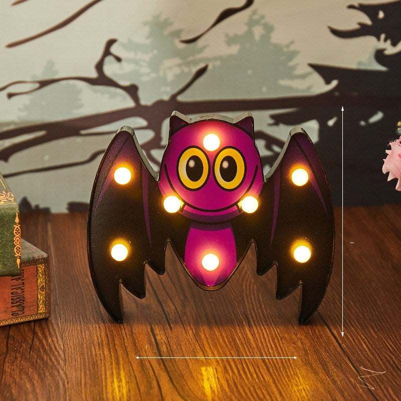 Halloween costume lights featuring a battery-powered purple bat-shaped LED decoration for indoor and outdoor use