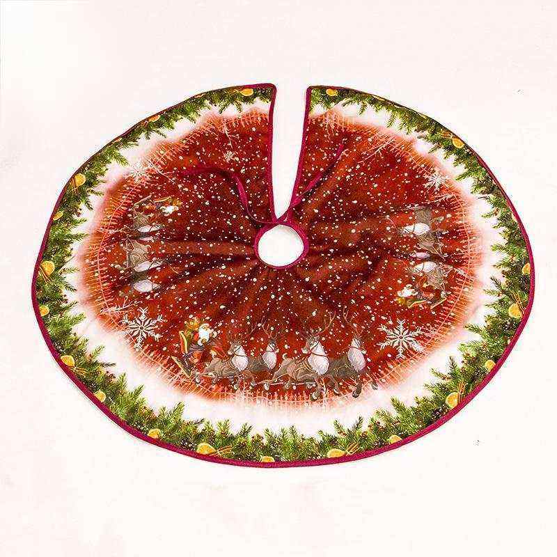 red Christmas tree skirt with Santa sleigh and reindeer design and green pine border
