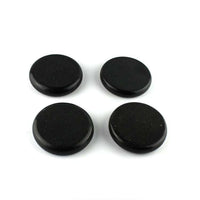 Set of four black energy stones for massage and health therapy