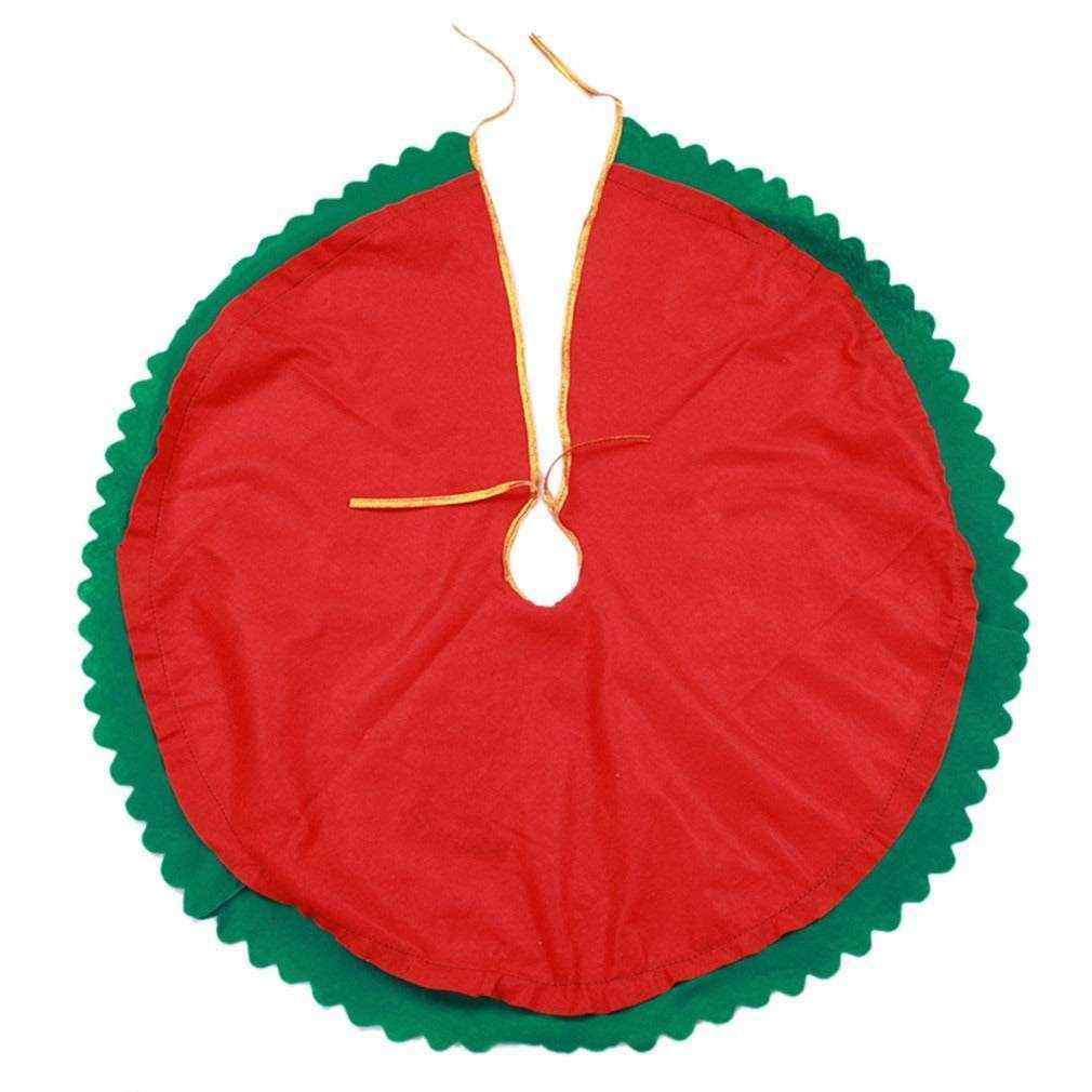 Red and green Christmas tree skirt with scalloped edges and tie closure