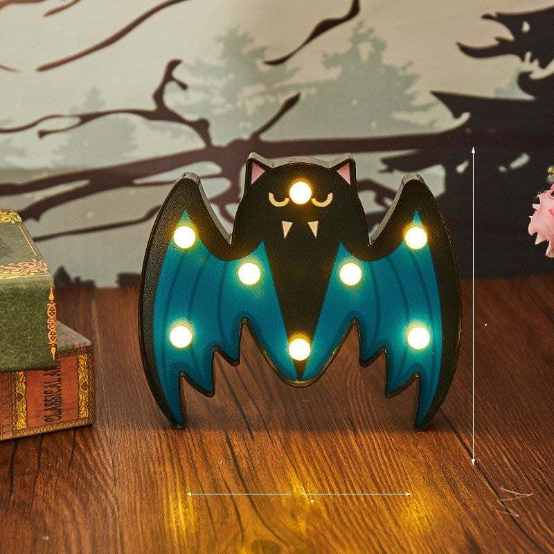 Halloween costume lights featuring a battery-powered purple bat-shaped LED decoration for indoor and outdoor use