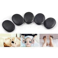 Natural black stone set for massage and spa therapy