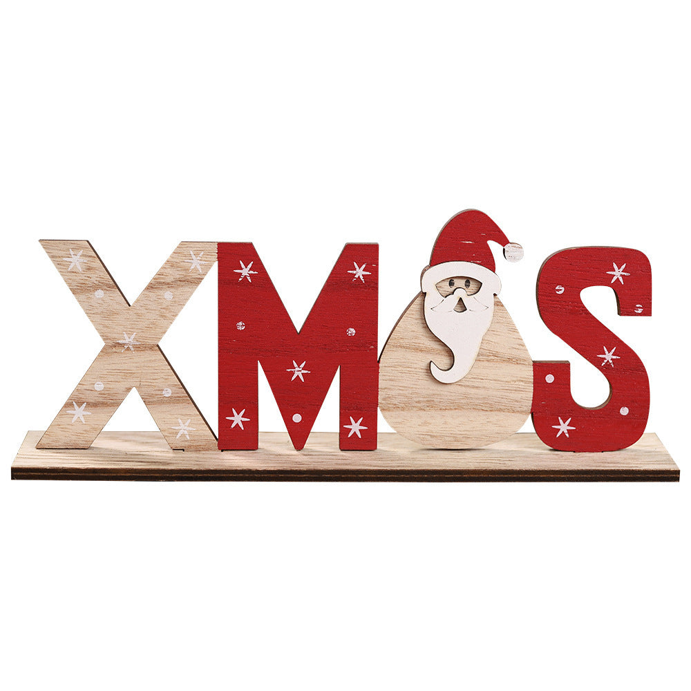 Set of Christmas wooden ornaments with festive letters and shapes including Santa, snowman, and snowflake designs.