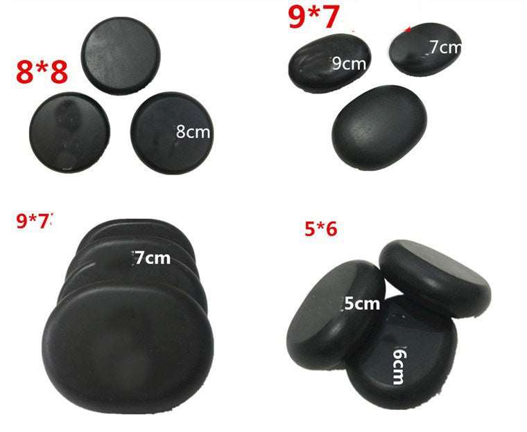 Natural black stone set for massage spa with various sizes for bathing and relaxation