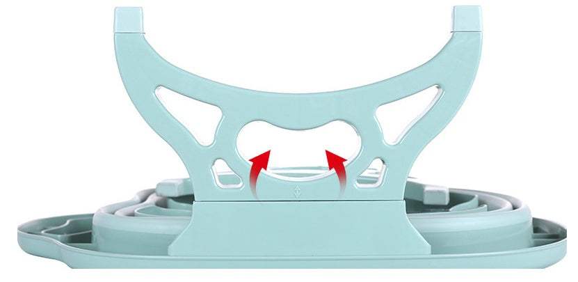 Foldable green plastic footbath massage bucket in compact folded position