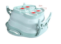 Collapsible green plastic foldable footbath with massage balls and handles for easy storage and portability