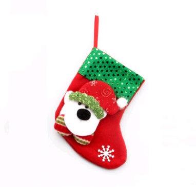 Red Christmas stocking with Santa Claus face and green sequined cuff hanging decoration Christmas decorations