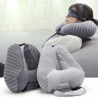 Travel pillow foam particle U-shaped cervical neck and lumbar support pillow with striped design worn by woman with eye mask