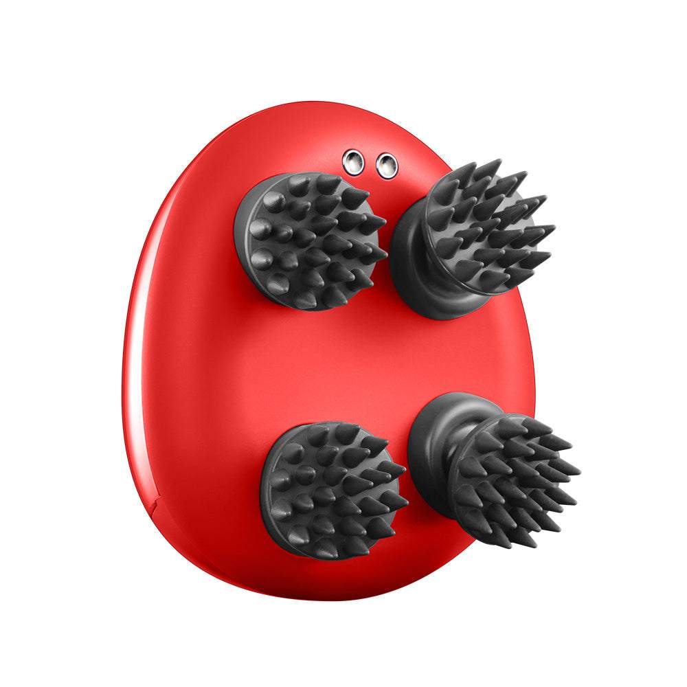 Red scalp massager with four black rotating massage nodes for relieving fatigue and scalp tension