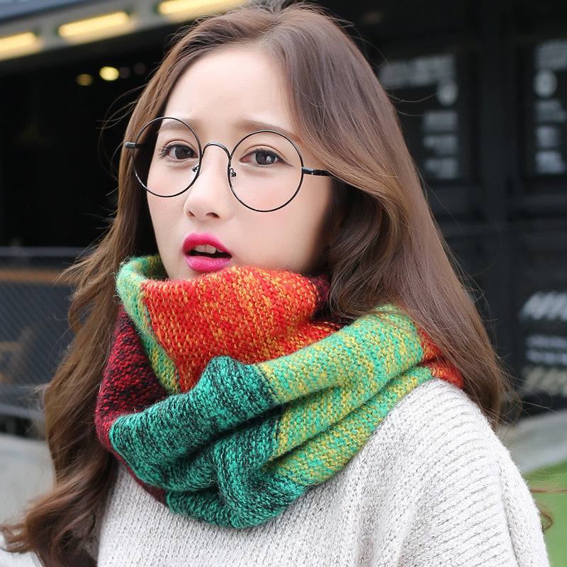 Woman wearing colorful knit wool neck wrap in cotton warp knitting jacquard design to keep warm