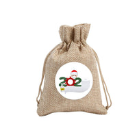 Christmas candybags filled with festive treats and gifts