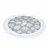 Gray and white Christmas tree skirt with snowflake pattern made of soft fabric