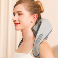 Woman using gray rechargeable shoulder and neck massager with USB charging and 3 gear settings