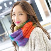 Woman wearing colorful knit wool neck wrap in cotton warp knitting jacquard design to keep warm