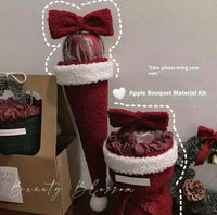 Christmas Gift Christmas Eve red bow apple fruit bouquet bundle in festive packaging