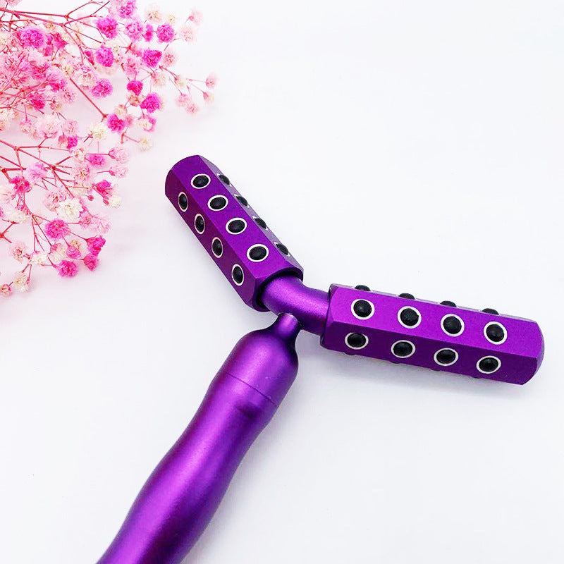 Purple 3D roller face massager with germanium particles for skin whitening and face lifting