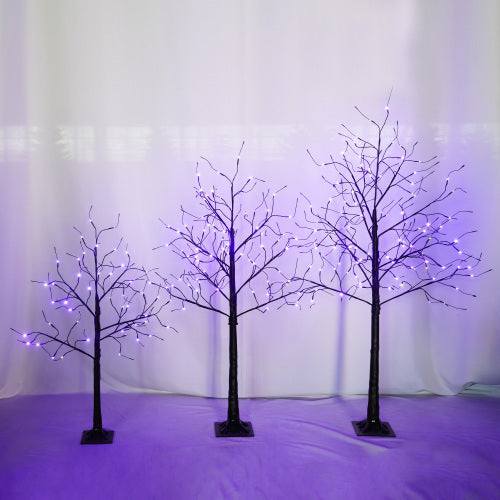 Set of three Halloween spooky trees in black with purple LED lights, sizes 4FT, 5FT, and 6FT, ideal for Halloween decorations.