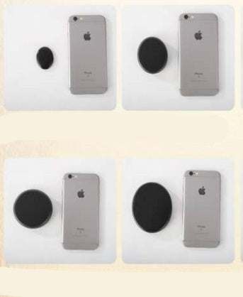 Natural black massage spa stones with iPhone for size comparison