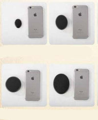 Natural black massage spa stones with iPhone for size comparison