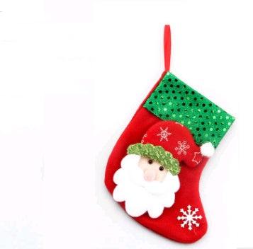 Red Christmas stocking with Santa Claus face and green sequined cuff hanging decoration