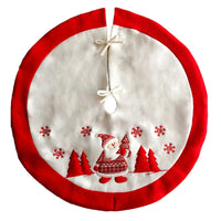 Red and white flannel Christmas tree skirt with Santa and snowflake design for festive decoration