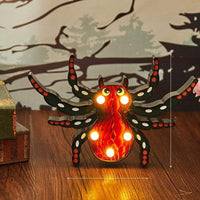 Halloween costume lights featuring a battery-powered purple bat-shaped LED decoration for indoor and outdoor use