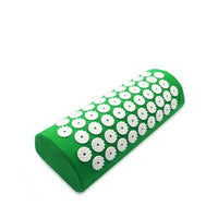 Green acupuncture massage pillow with white acupressure spikes for neck and muscle pain relief