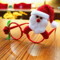 Christmas glasses frame with Santa Claus design, red plastic and fabric party eyewear decoration