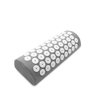 grey acupuncture massage pillow with white acupressure spikes for neck pain relief