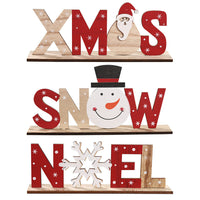Set of Christmas wooden ornaments with festive letters and shapes including Santa, snowman, and snowflake designs.