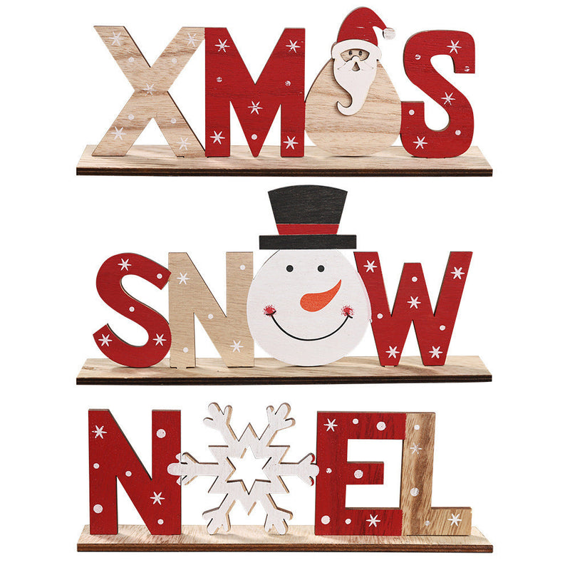 Set of Christmas wooden ornaments with festive letters and shapes including Santa, snowman, and snowflake designs.