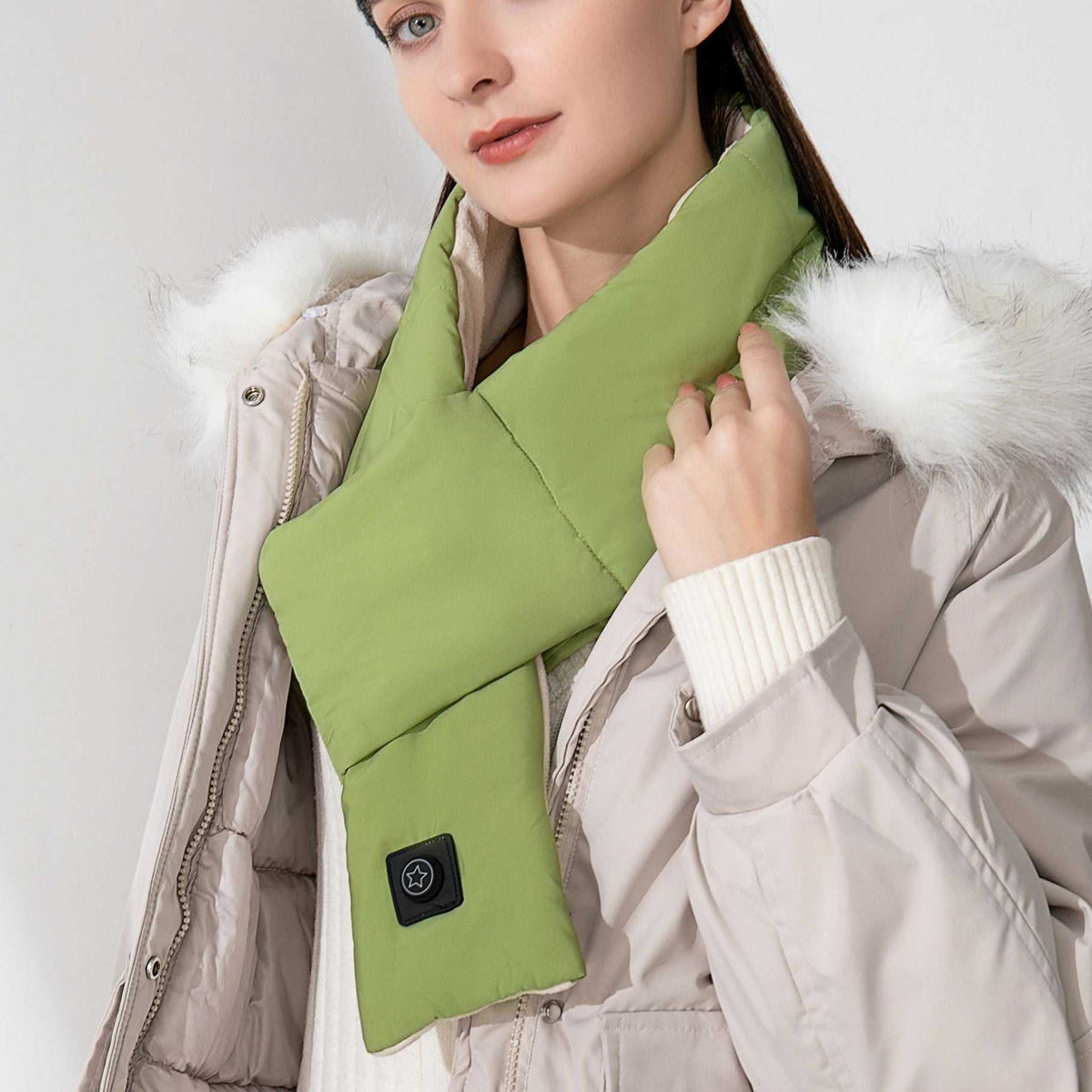 Woman wearing green Electric Neck Smart Heat Shawl for warmth and magnetic therapy