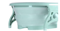 Foldable plastic footbath massage bucket with massage balls and space-saving design in green