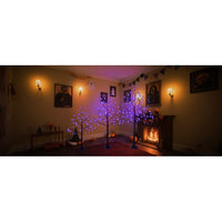 Set of three black Halloween spooky trees with adjustable branches and purple LED lights, 4ft, 5ft, and 6ft tall, indoor decoration.