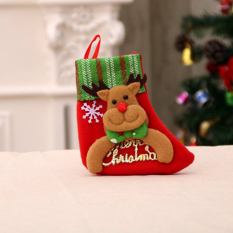 Red Christmas sock decoration with reindeer and green striped cuff, festive holiday ornament