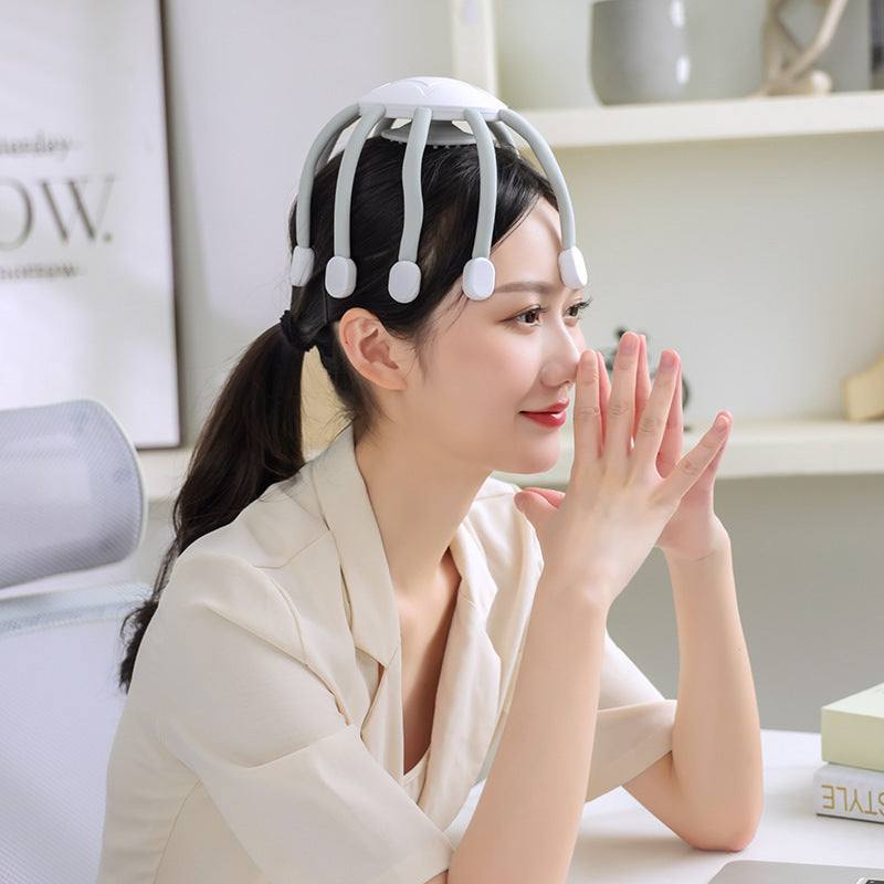 Woman using white USB-powered head massager with eight claw tips for scalp relaxation