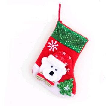 Red Christmas stocking with polar bear and Christmas tree decorations, sequined green cuff, holiday decoration gift bag