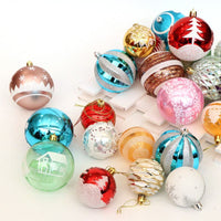 Assorted colorful 6cm hand-painted Christmas balls for tree decoration including red, blue, gold, green, and pink designs