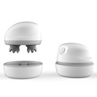 Compact white electric head massager with kneading scalp attachments and portable base