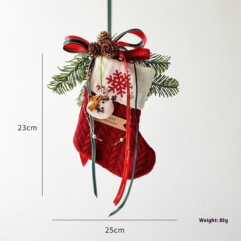 Festive knitted stockings Christmas Decoration hanging by fireplace