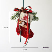 Festive knitted stockings Christmas Decoration hanging by fireplace