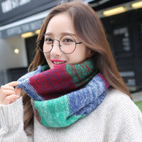 Woman wearing colorful knit wool neck wrap in cotton warp knitting jacquard design to keep warm