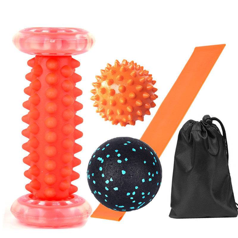 Orange foot massager roller set with spike ball, comfort ball, resistance ring, and storage bag